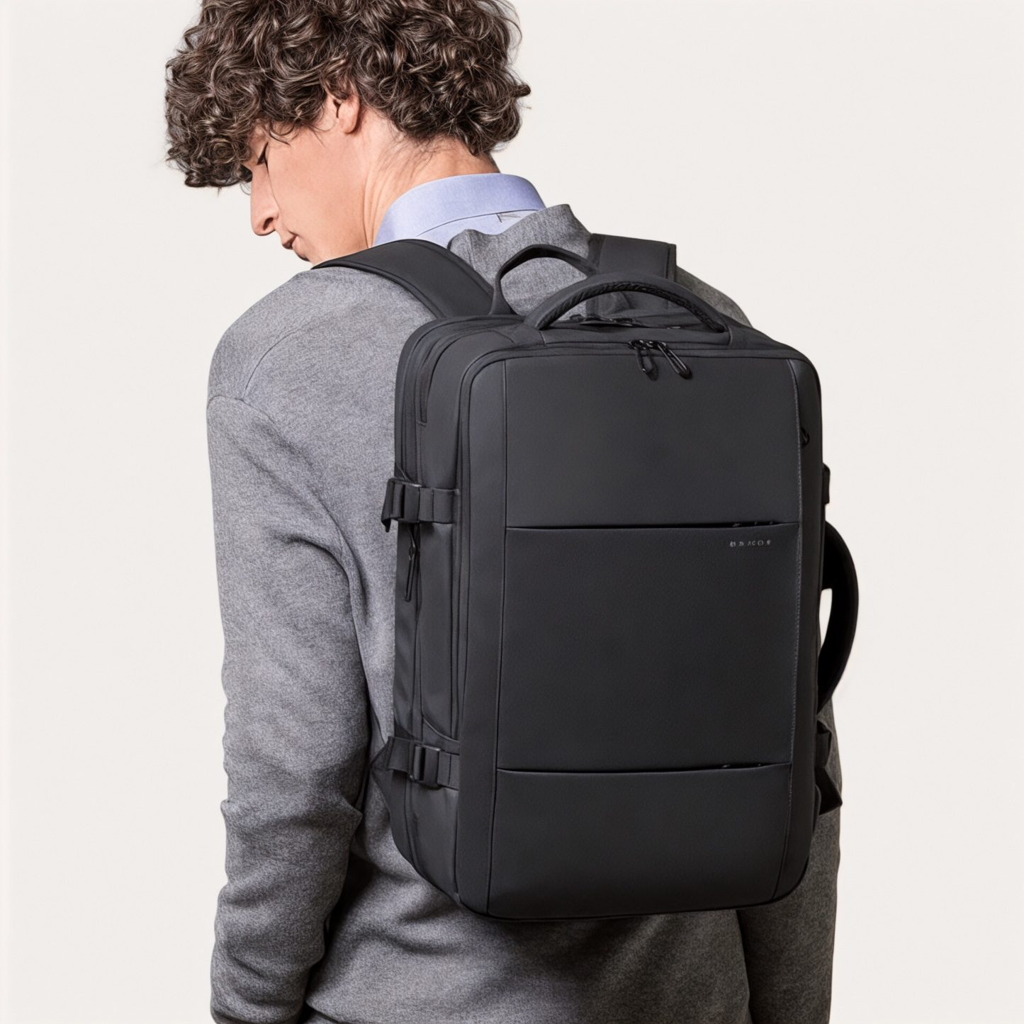 Mochila de viaje extensible 22L→37L | USB, impermeable, 17,3"