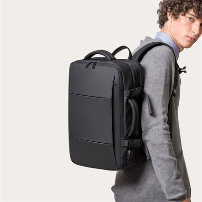 Mochila de viaje extensible 22L→37L | USB, impermeable, 17,3"